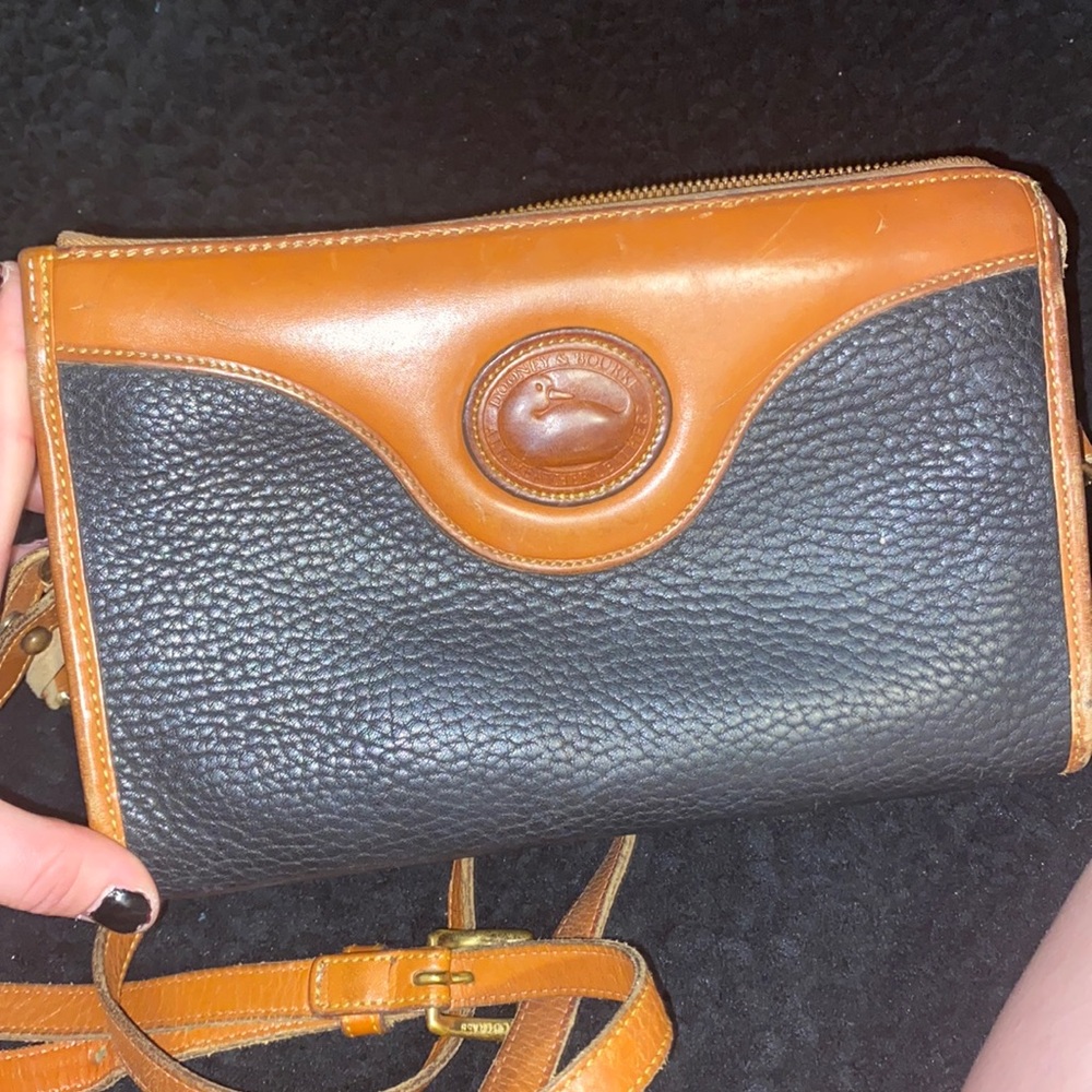 Dooney & Bourke Vintage and VERY rare. All weather leather. Its a beauty.